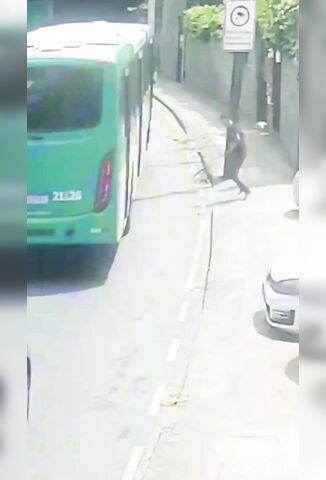 Sad Man Dives Head First Under A Passing Bus