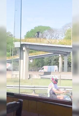 Man Jumps To A Bone Crunching End From A Pedestrian Bridge