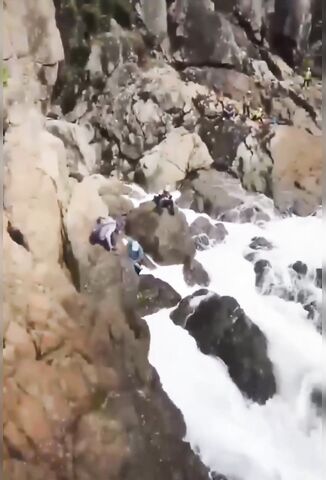 Man Climbing On The Rocks Swept Out To Sea Forever More