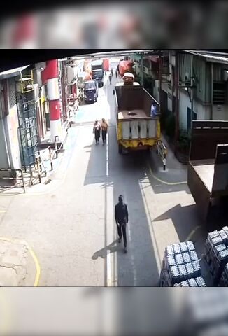 Truck Tailgate Scores A Perfect Headshot On Unsuspecting Passer By