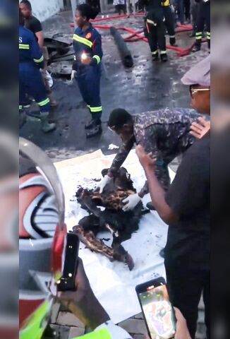 Woman Removed From The Burnt Out Remains Of An Accident