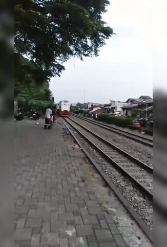 Depressed Man Jumps In Front Of A Passing Train In Indonesia