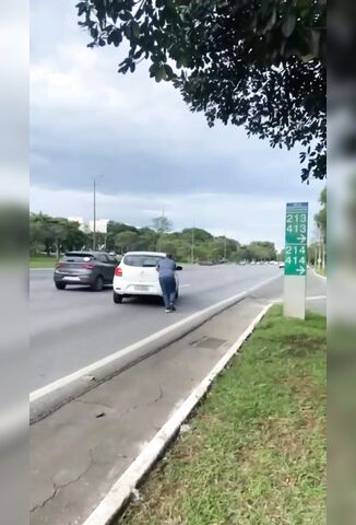 Idiot Pushing His Broken Down Car Along A Busy Highway Pays The Ultimate Price