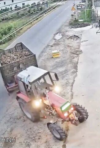 Biker Becomes One With A Turning Tractor