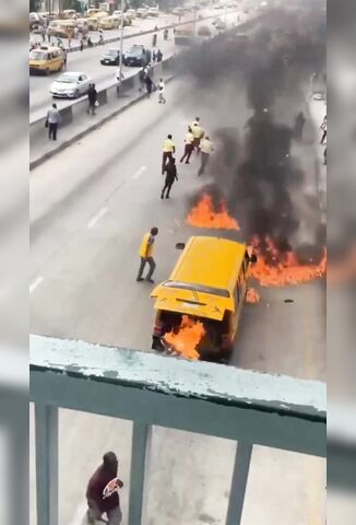 Lagos Traffic Officer Set On Fire Attempting To Impound Drivers Bus