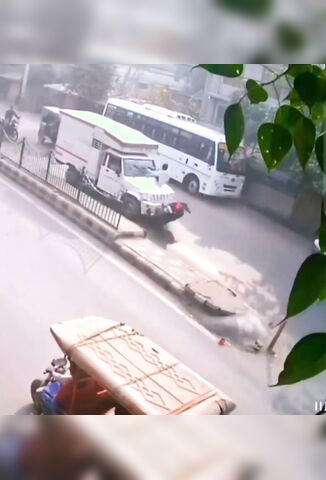 Biker From India Tries To Hug A Truck Walks It Right Off