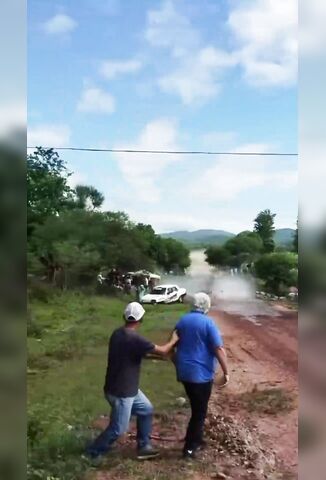 Cameraman At The Tucuman Rally Becomes Part Of The Race