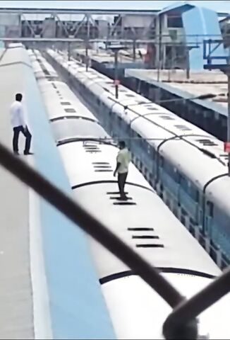 Indian Man Wants To Ride The Roof Of The Train Because It's Less Crowded