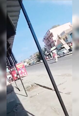 Ambulance Sends A Woman To The Cemetery Crossing The Road