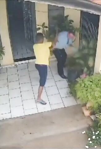 Crazed Lunatic With A Large Knife Attacks A Man Walking Into His House