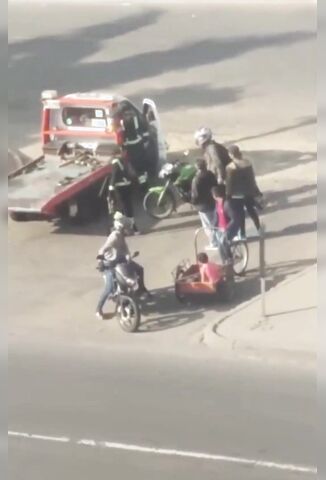 Angry Biker Knocks Out Rescue Worker With One Throw Of His Helmet