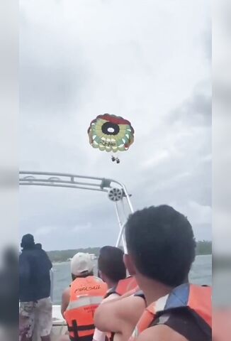 Couple Smashed Hard Into Beach After Parasailing Rope Snaps