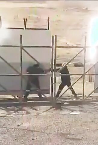 Man Flattened By Huge Metal Gate