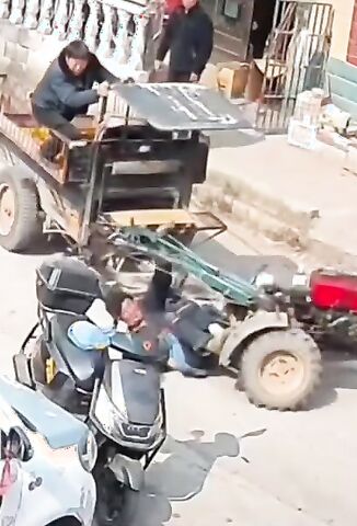 Old Guy Runs Himself Over With His Own Tractor