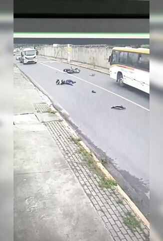 Speeding Biker Loses Control Over A Speedbump Rides Head On Into A Bus