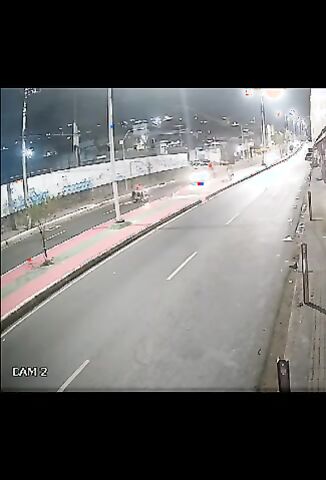 Biker Attempts A U Turn In The Fast Lane