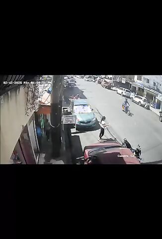 Two Teens On A Bike Lose Control Doing A Wheelie