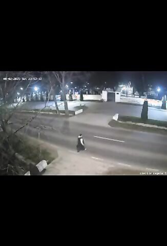 Man Stands In The Road Telling Of A Speeding Car