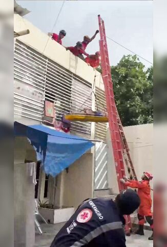 Elderly Man Falls From Roof While Being Rescued By Firefighters