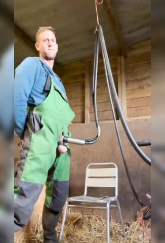 Farmer Takes A Break After Milking The Cows