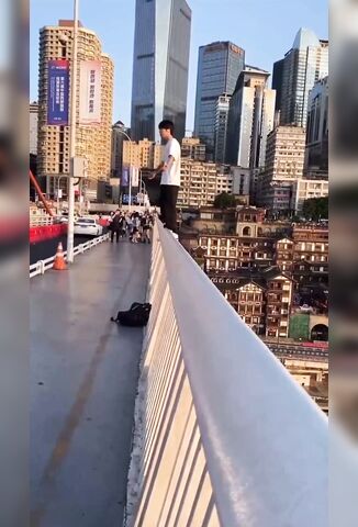 Young Man Ends It All By Graciously Falling Backwards Off A Tall Bridge