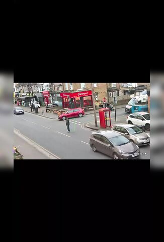 Man Crossing The Street In London Mistimes His Chance