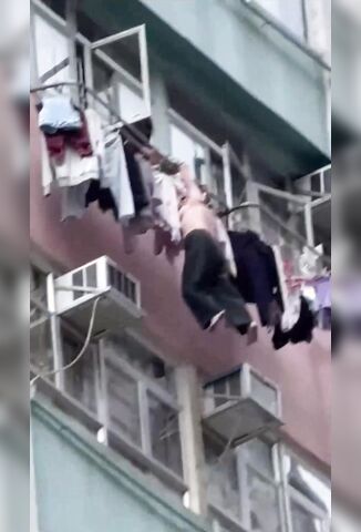 Topless Woman Falls To Her Death After hanging Off Washing Line