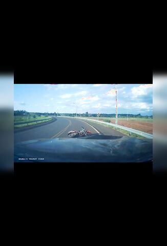 Headon With A Car And No Helmet