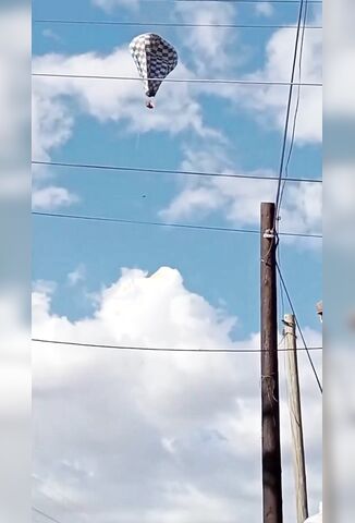 Hot Air Balloon Catches Fire Man Clings To Ground Rope Then Falls