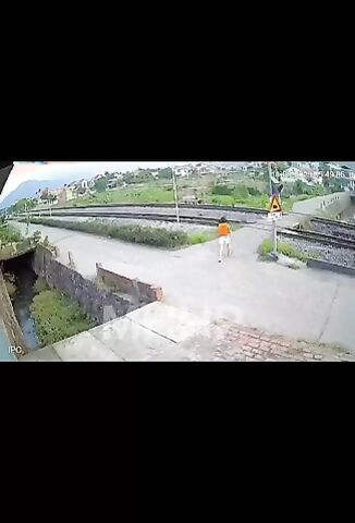 Retarded Woman Walks Straight Into A Passing Train