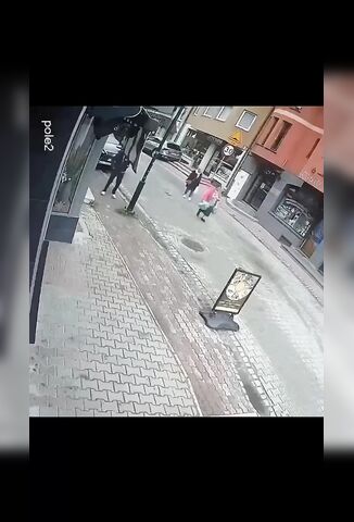 Drunk Man Gives Passing Babushka A Present