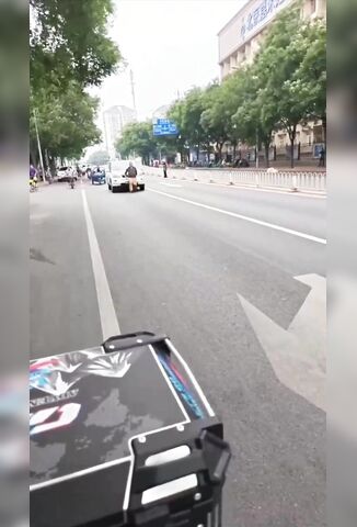 Man Thinks He Can Stop An SUV From Leaving The Area