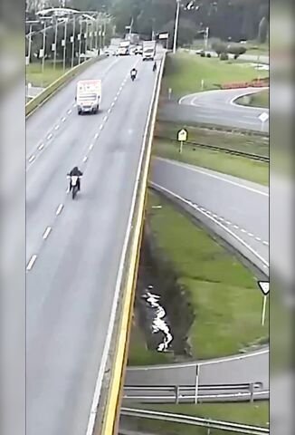 Biker Sent Plunging Off Bridge By Box Truck