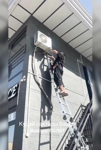 Worker Fixing Air Con Unit Electrocutes Himself