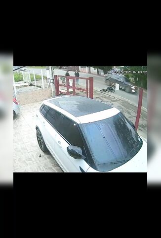 Cyclist Knocked Off And Goes Under Passing Bus Wheels