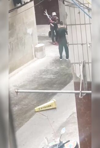 Poor Man Attacked In The Streets Of China By Machete Wielding Lunatic