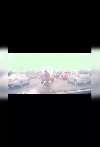 Lane Splitting Biker Becomes Split By Trucker