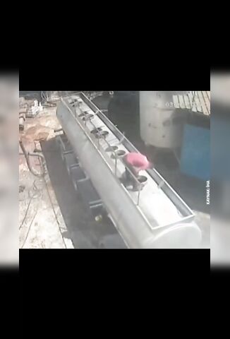 Looking In An Explosive Truck Container Smoking A Cigarette