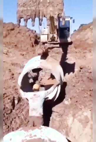 Construction Worker Pinned Under Concrete