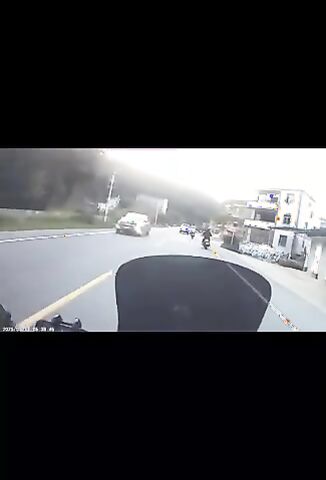 Overtaking Biker Choses The Worst Possible Moment