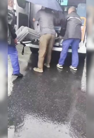 Man On A Stretcher Needs Help