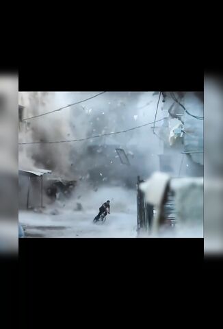 Escaping A Building Collapse In Gaza By Bicycle