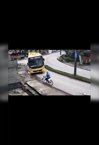 Cyclist Takes On A Bus