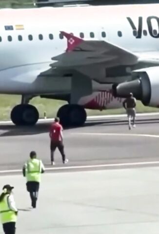 Crazed Man Runs Onto The Airport Runway And Jumps Into A Planes Jet Engine