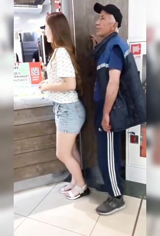 Perverted Old Guy Rubbing Up Against A Girl In Line