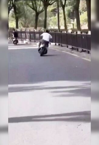 Headbutting A Fence To Finish The Wheelie