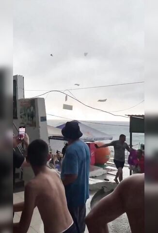 Waterspout Ruins Beachgoers Day