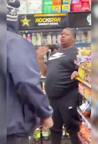 Big Bitch Throws Water At The Wrong Guy