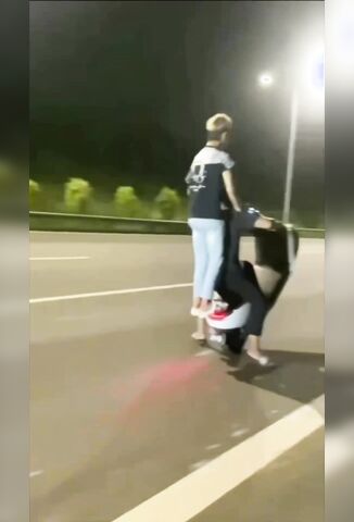 Car Driver Has No Time To Be Impressed By Their Wheelie