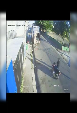 Biker Slams Into The Back Of A Refuse Truck